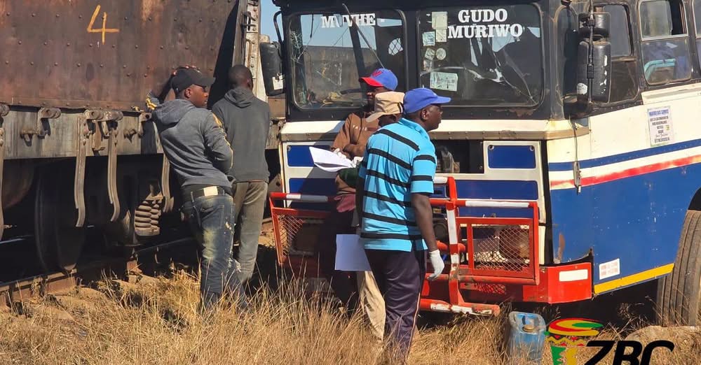 A bus and train wreckage after collision. Photo credit - ZBC News